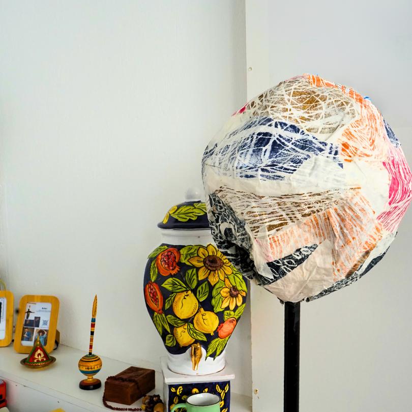 Upcycled paper lamp with support