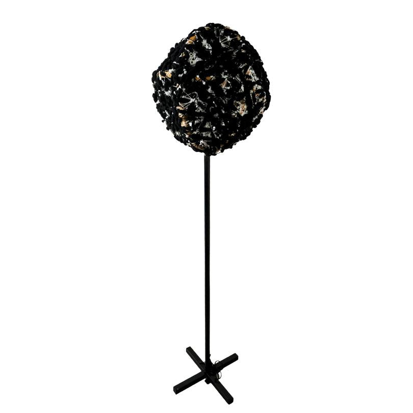 Upcycled lamp with embroidered black wool support