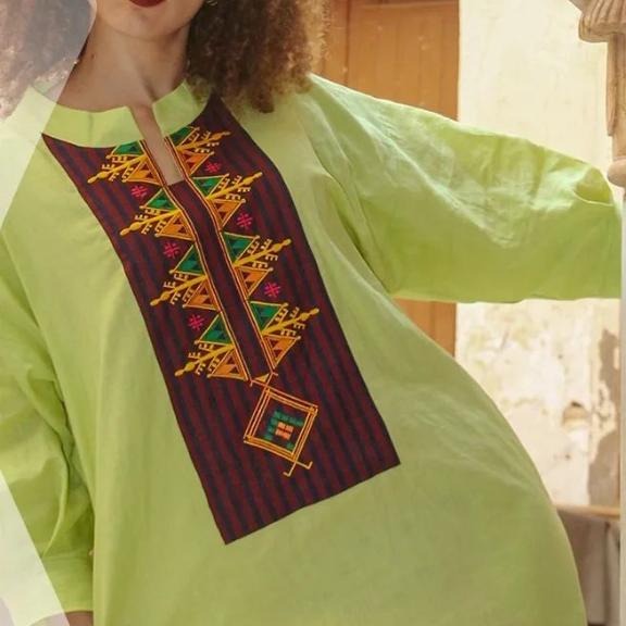 Traditional pistachio green jebba dress for women with Berber patterns