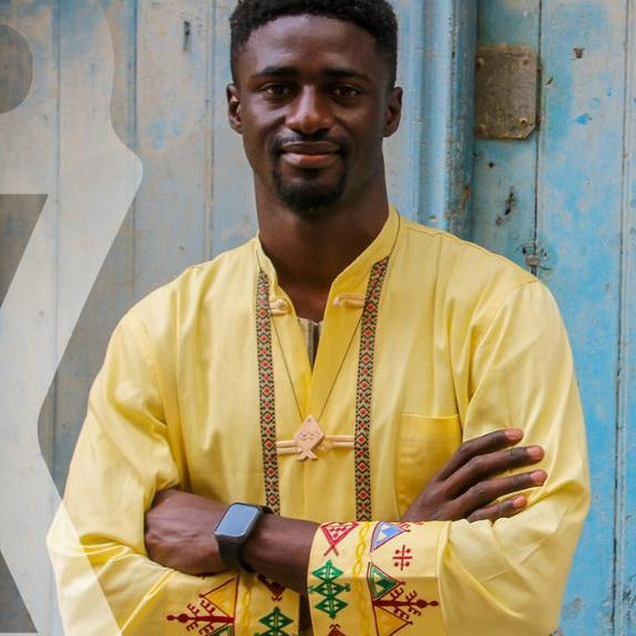 Traditional yellow shirt with Berber patterns