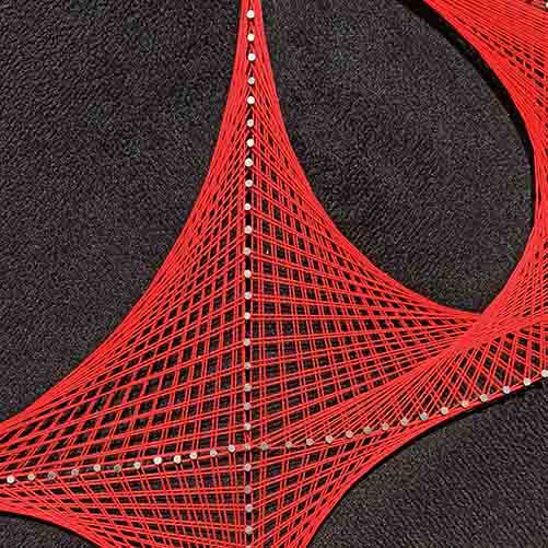 String art painting of red geometric shapes